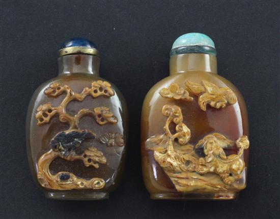 Two Chinese chalcedony cameo snuff bottles, late 19th / early 20th century, 4.8 and 5cm